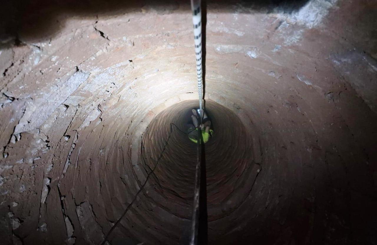 BOMBEIROS RETIRAM CACHORRO E HOMEM DE CISTERNA EM PATOS DE MINAS