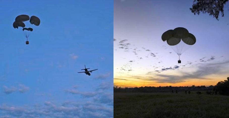 FAB LANÇA MANTIMENTOS DE PARAQUEDAS EM ÁREAS ISOLADAS NO RIO GRANDE DO SUL