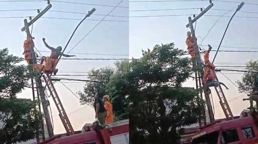 HOMEM SOBE EM POSTE, SE ENROLA NOS FIOS E AMEAÇA SE JOGAR EM JOÃO PINHEIRO